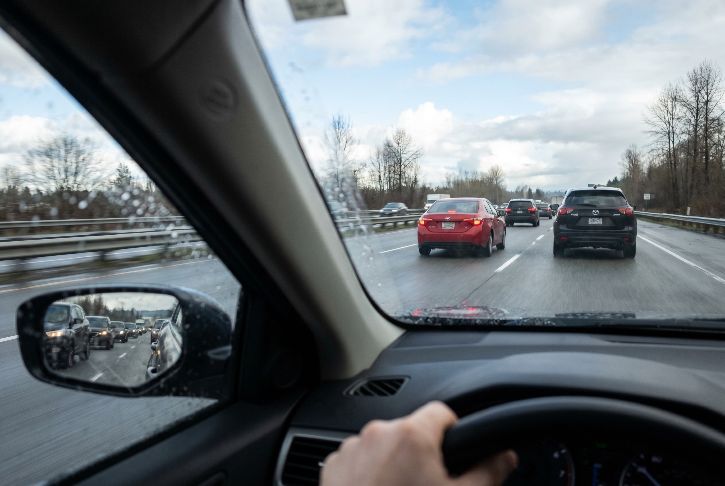 You are merging and traffic is dense. A gap appears but requires another driver to brake slightly. What should you do?