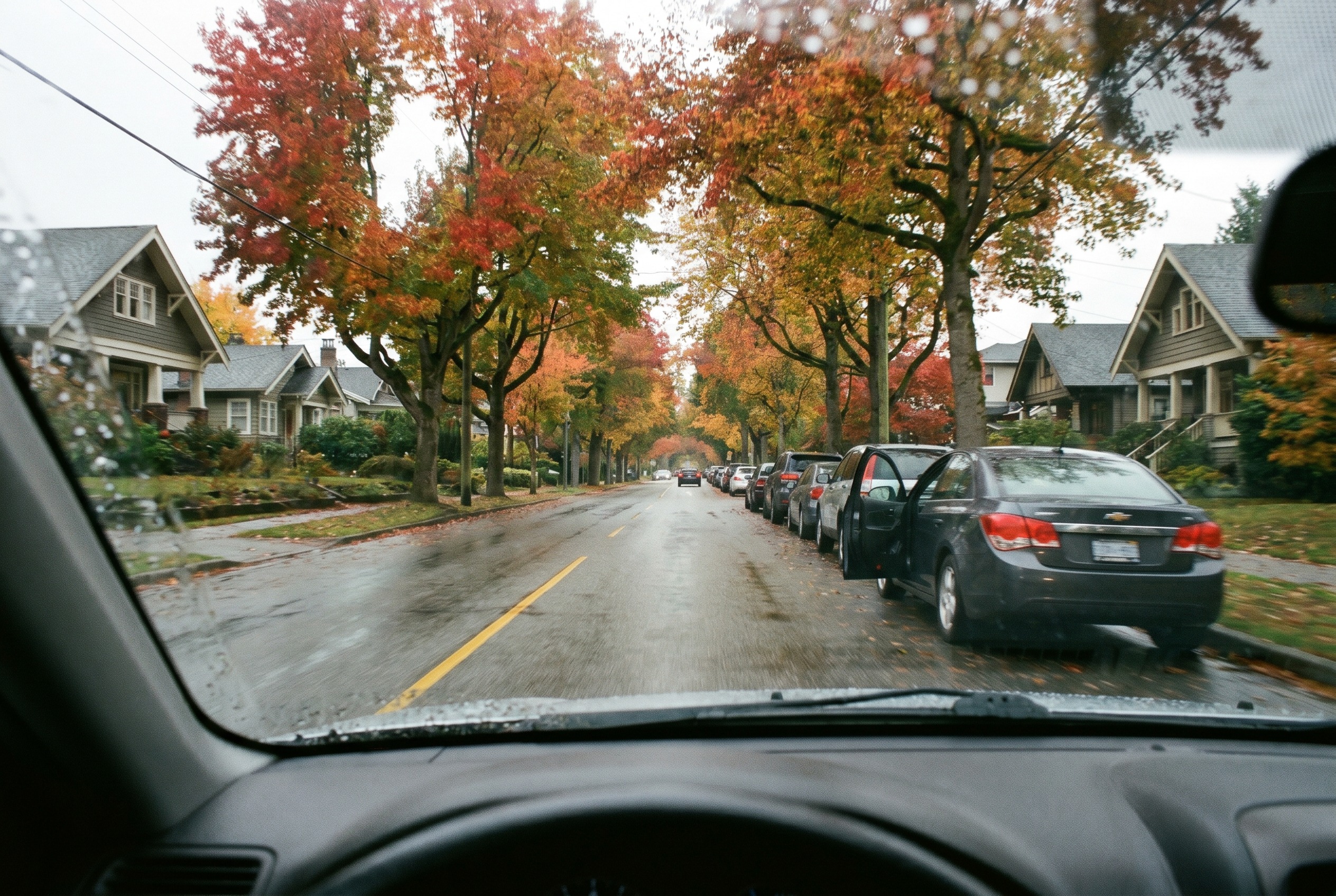 You are driving beside parked cars and see a door slightly ajar. What is the greatest risk?