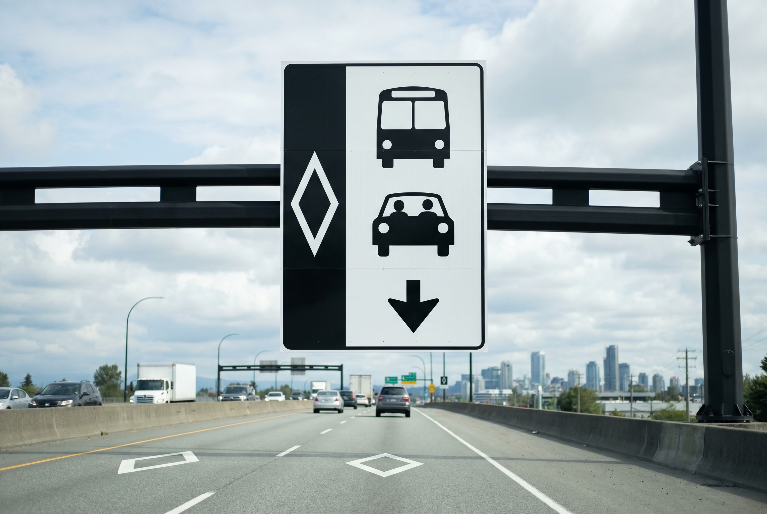 A thick solid or broken line with white diamond symbols marks an HOV lane. What should you check?